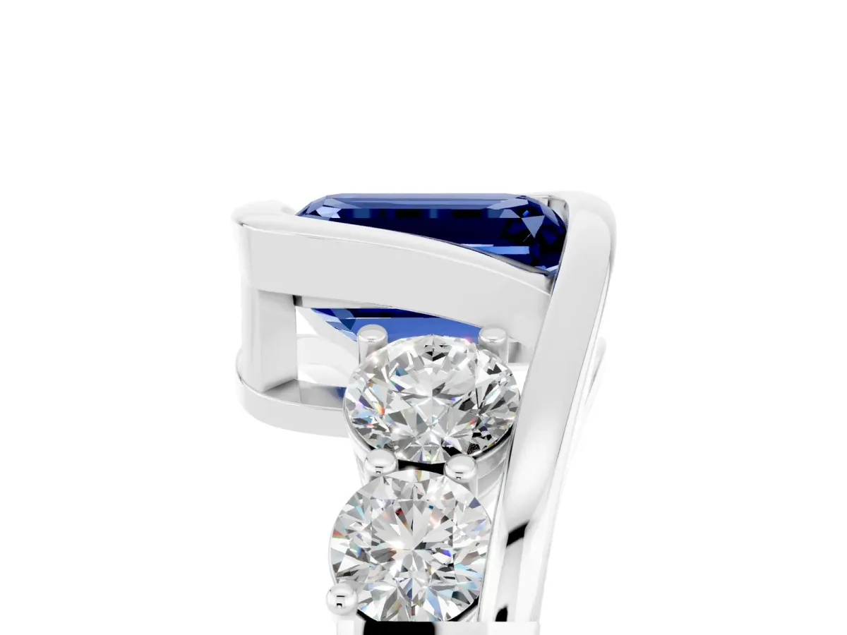 Bezel Set Emerald Cut Blue Sapphire Bypass Ring with Round Accents Platinum