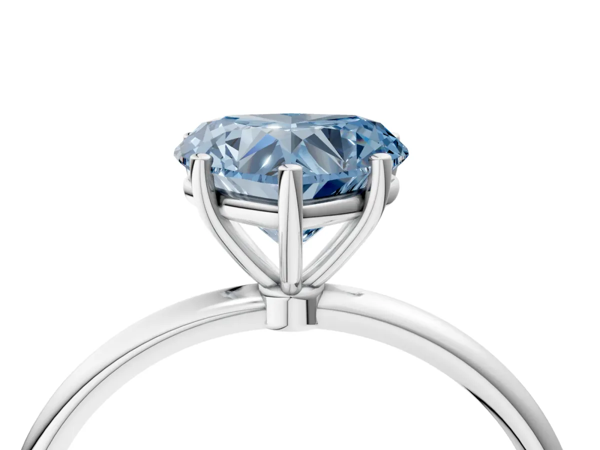 Fancy Blue Heart Cut Cut Solitaire Engagement Ring with Thin Band and Four-Prong Setting Platinum