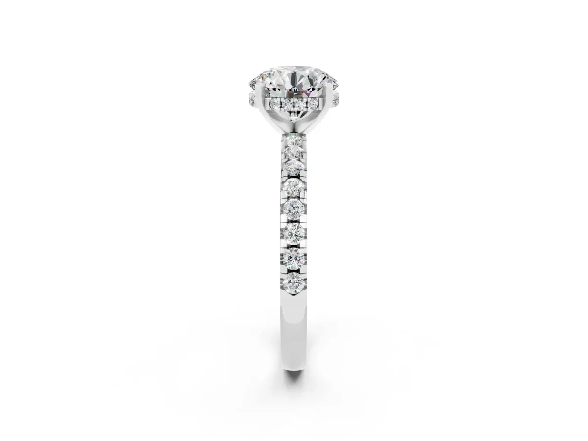 Round Cut Moissanite Solitaire Ring with Round Pavé Band and Four-Prong Setting Silver