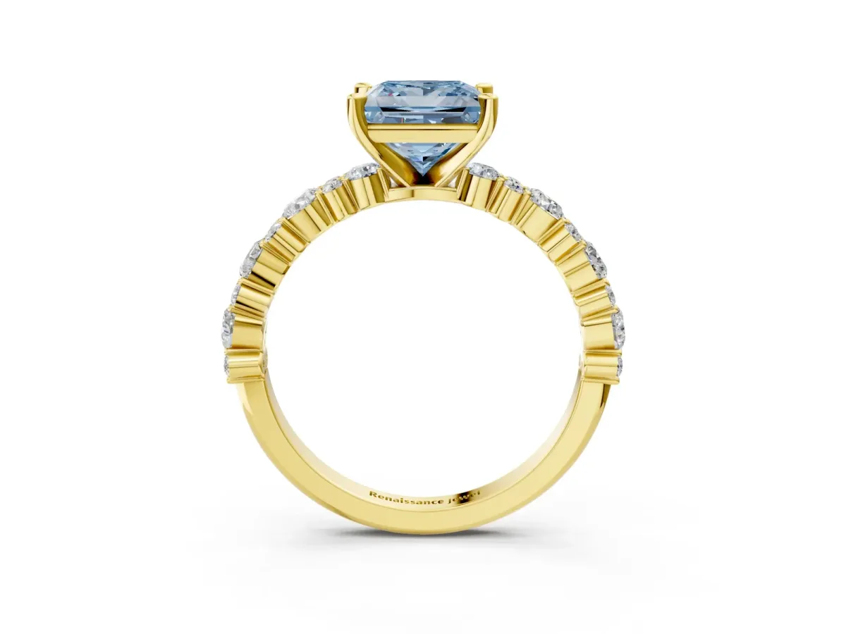 Fancy Blue Princess Cut Diamond Side Stone Solitaire Ring with Round and Four-Prong Setting Yellow gold