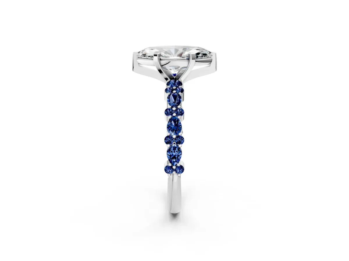 Marquise Cut Diamond Side Stone Solitaire Ring with Round Blue Sapphire and Four-Prong Setting Platinum