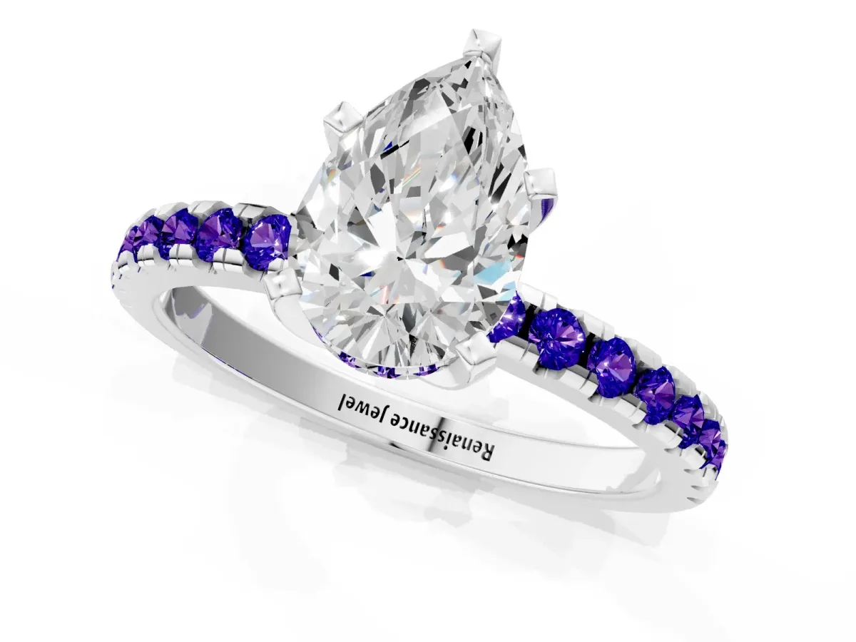 Pear Cut Diamond Solitaire Ring with Round Tanzanite Pavé Band and Four-Prong Setting Silver