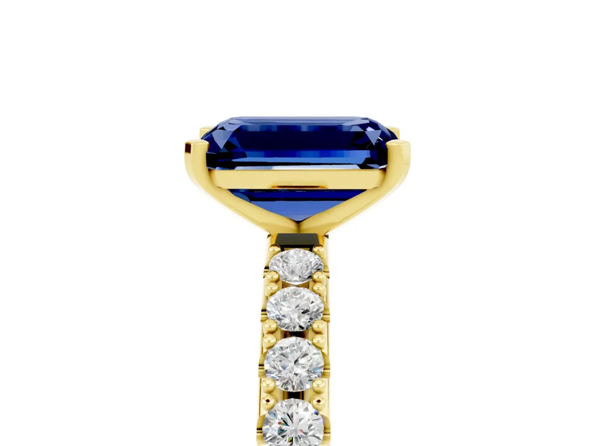 Emerald Cut Blue Sapphire Solitaire Pavé Band with Four-Prong Setting Yellow gold