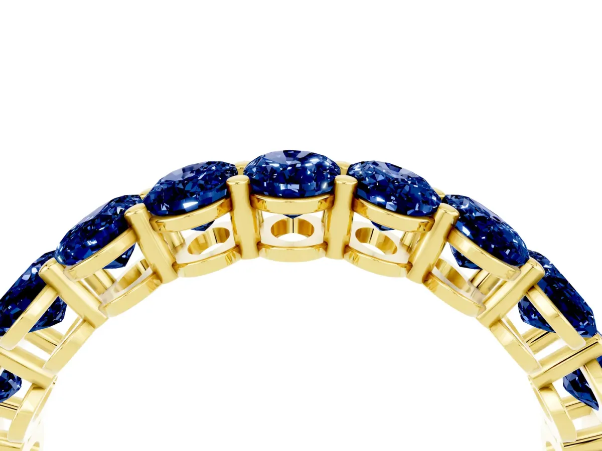 Oval Cut Blue Sapphire Eternity Band with Shared Prong Setting Yellow gold