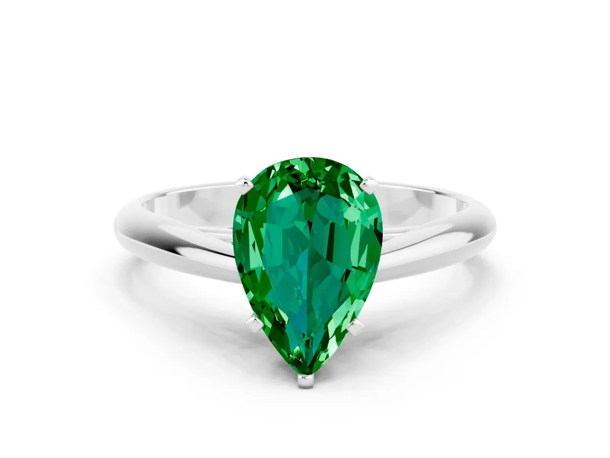 Pear Cut Emerald Solitaire Engagement Ring with Cathedral Setting and Four-Prong Mount White gold