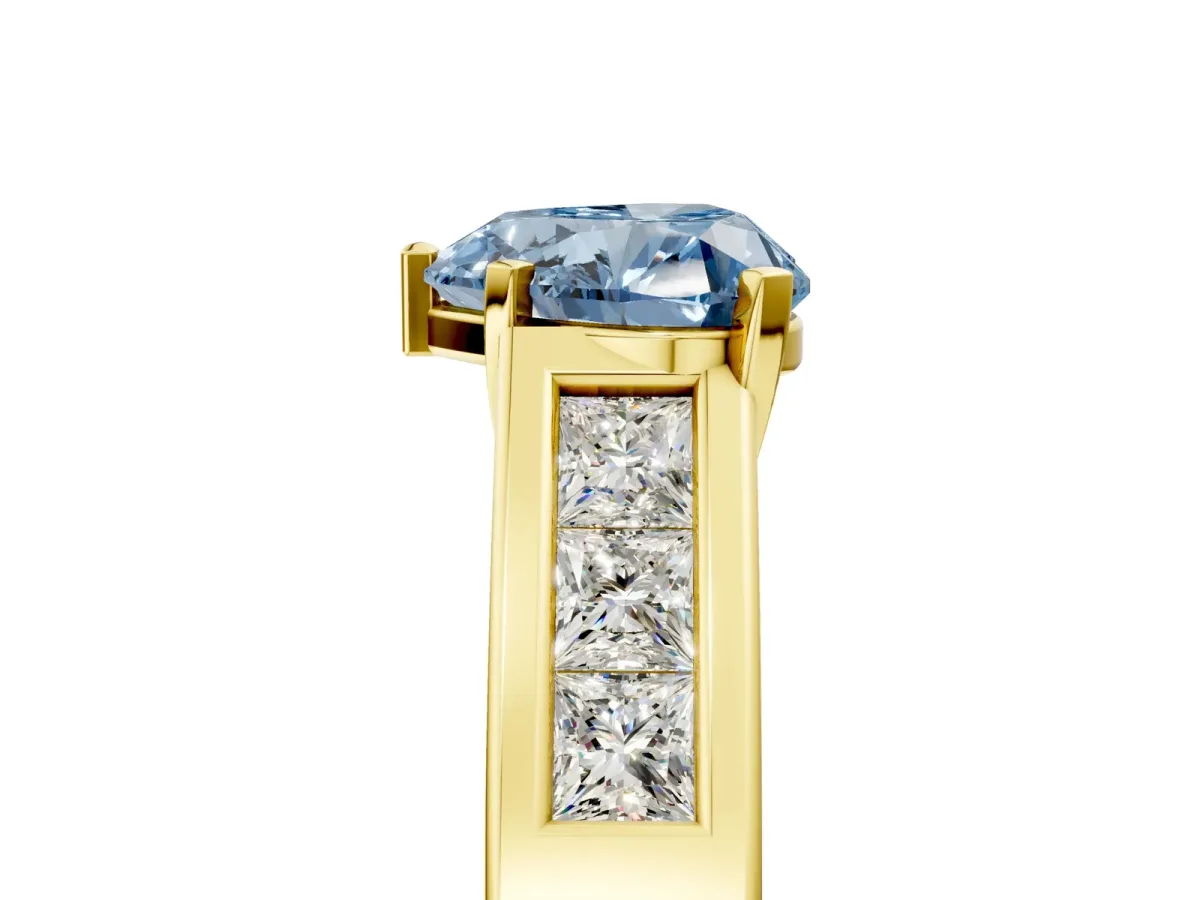 Fancy Blue Heart Cut Cut Channel Set Solitaire Ring with Four-Prong Setting Yellow gold