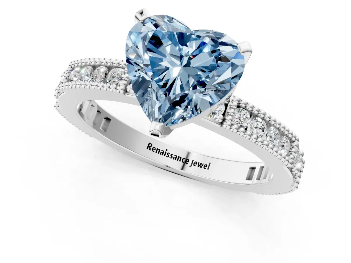 Fancy Blue Heart Cut Solitaire with Pavé Band and Four-Prong Setting Silver