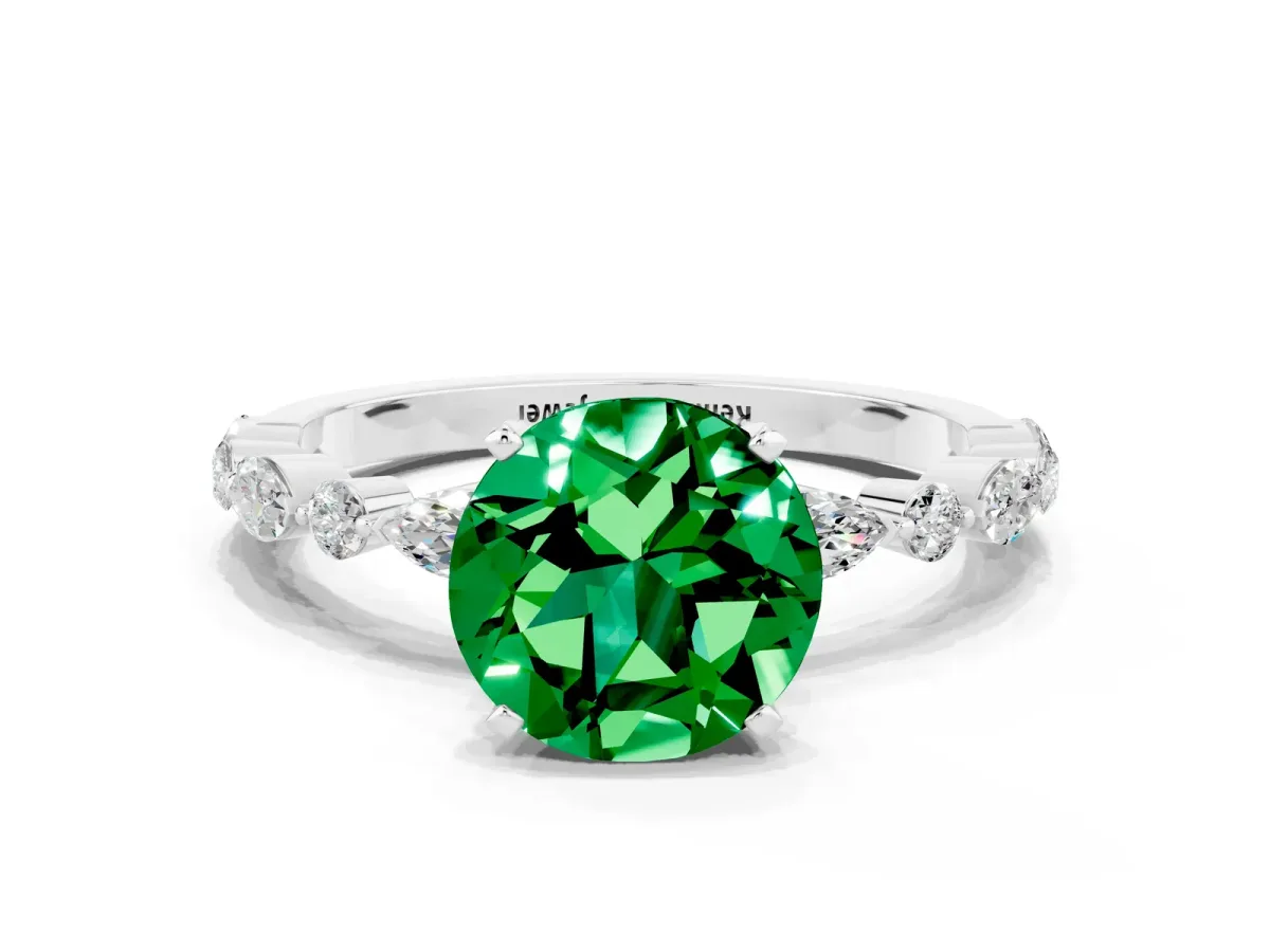 Round Cut Emerald Ring with Marquise and Round Side Stones and Four-Prong Setting Silver