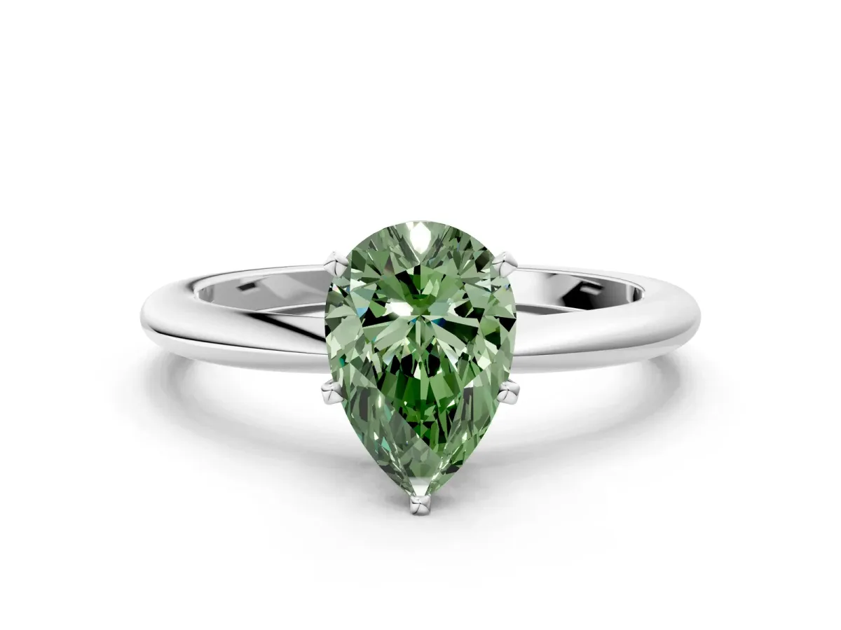 Fancy Green Pear Cut Diamond Solitaire Ring with Six-Prong Setting and Classic Band Silver
