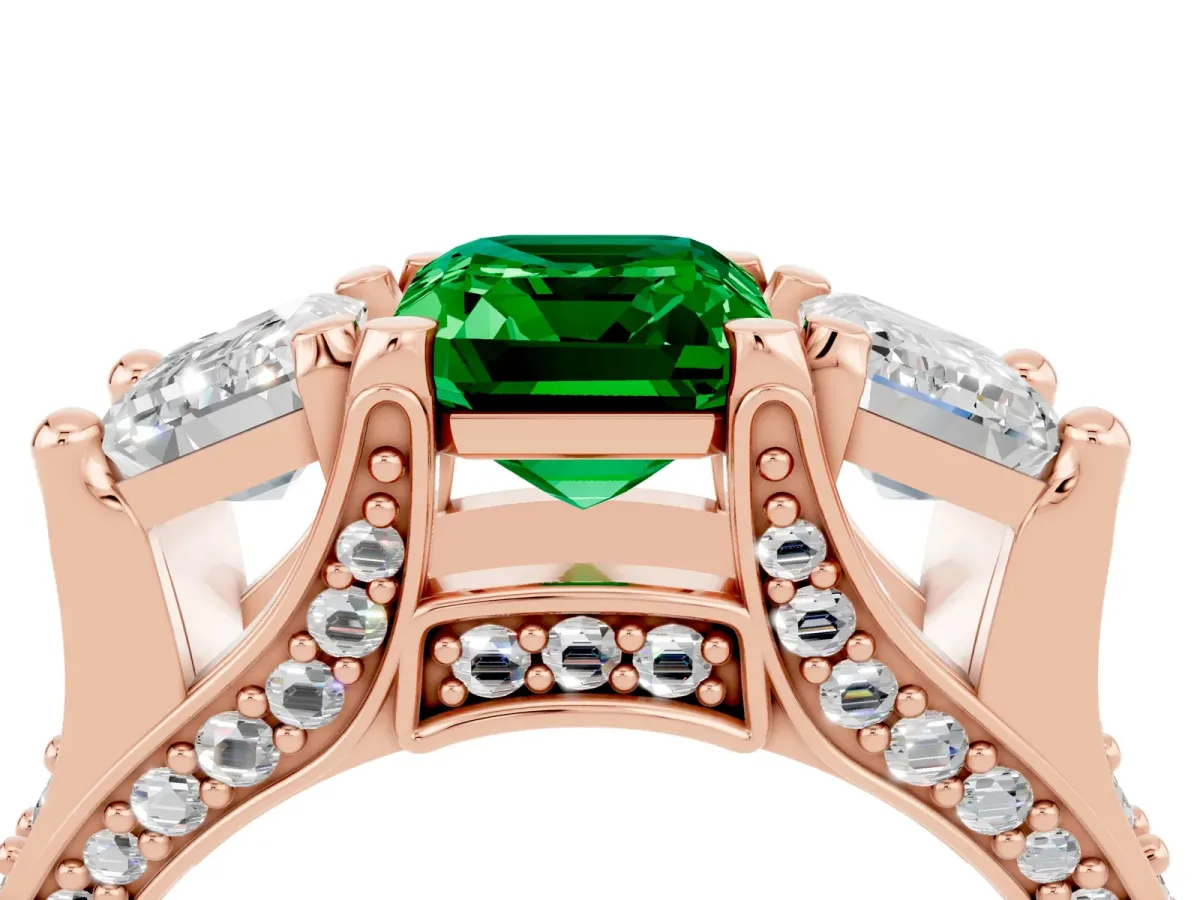 Emerald Cut Emerald Three-Stone Ring with Channel Set Band and Four-Prong Setting Rose gold