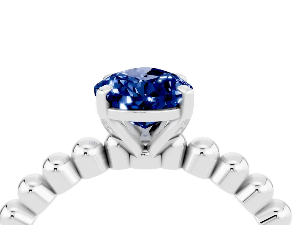Pear Cut Blue Sapphire Solitaire Ring with Beaded Band and Prong Setting White gold