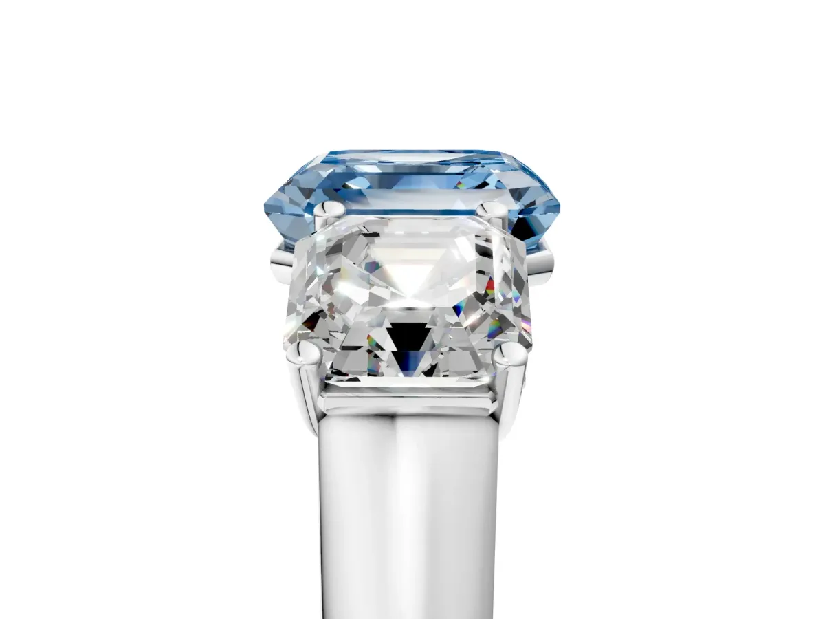 Fancy Blue Asscher Cut Three-Stone Diamond Ring with Prong Setting on a Classic Band Platinum