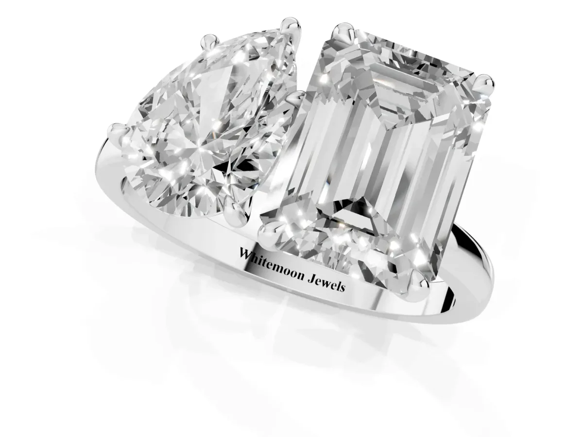 Pear Cut and Emerald Cut Toi Moi Ring with Prong Setting Platinum