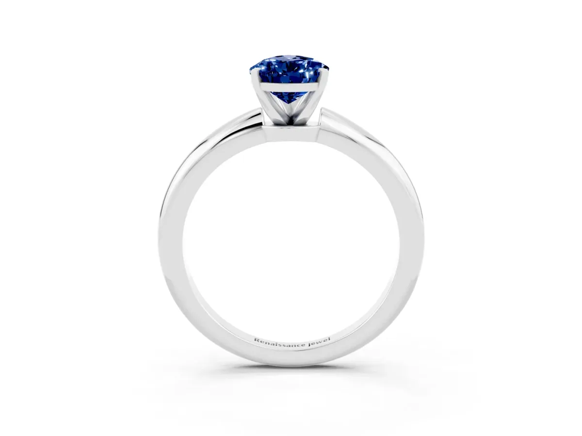 Pear Cut Blue Sapphire Solitaire Ring with Six-Prong Setting and Classic Band Silver
