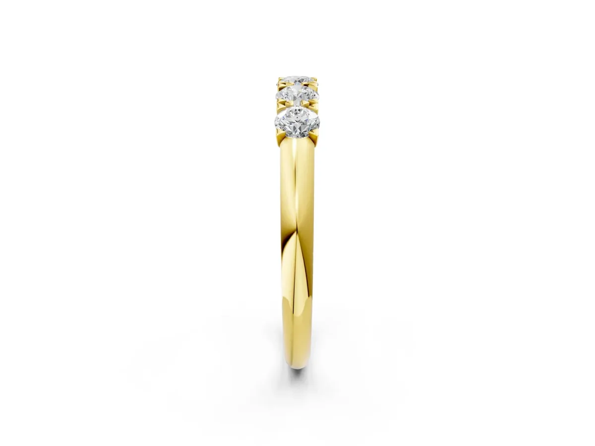 Round Diamond Channel Set Half Eternity Band with Shared Prong Setting Yellow gold