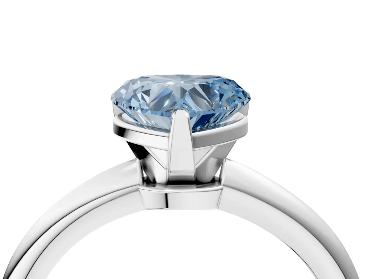 Fancy Blue Heart Cut Diamond Solitaire Ring with Six-Prong Setting and Classic Band Silver