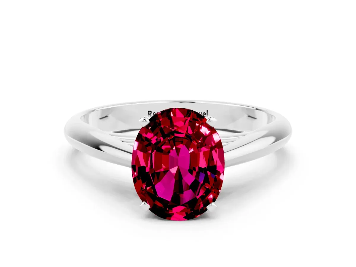 Oval Cut Garnet Solitaire Engagement Ring with Cathedral Setting and Four-Prong Mount White gold