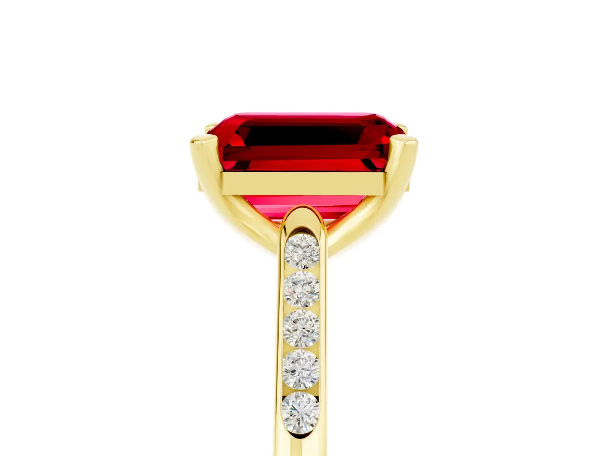 Emerald Cut Ruby Solitaire Ring with Channel Set Round Band and Prong Setting Yellow gold