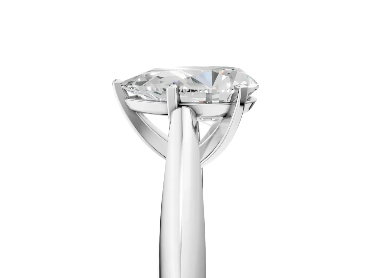 Pear Cut Diamond Solitaire Engagement Ring with Cathedral Setting and Four-Prong Mount White gold