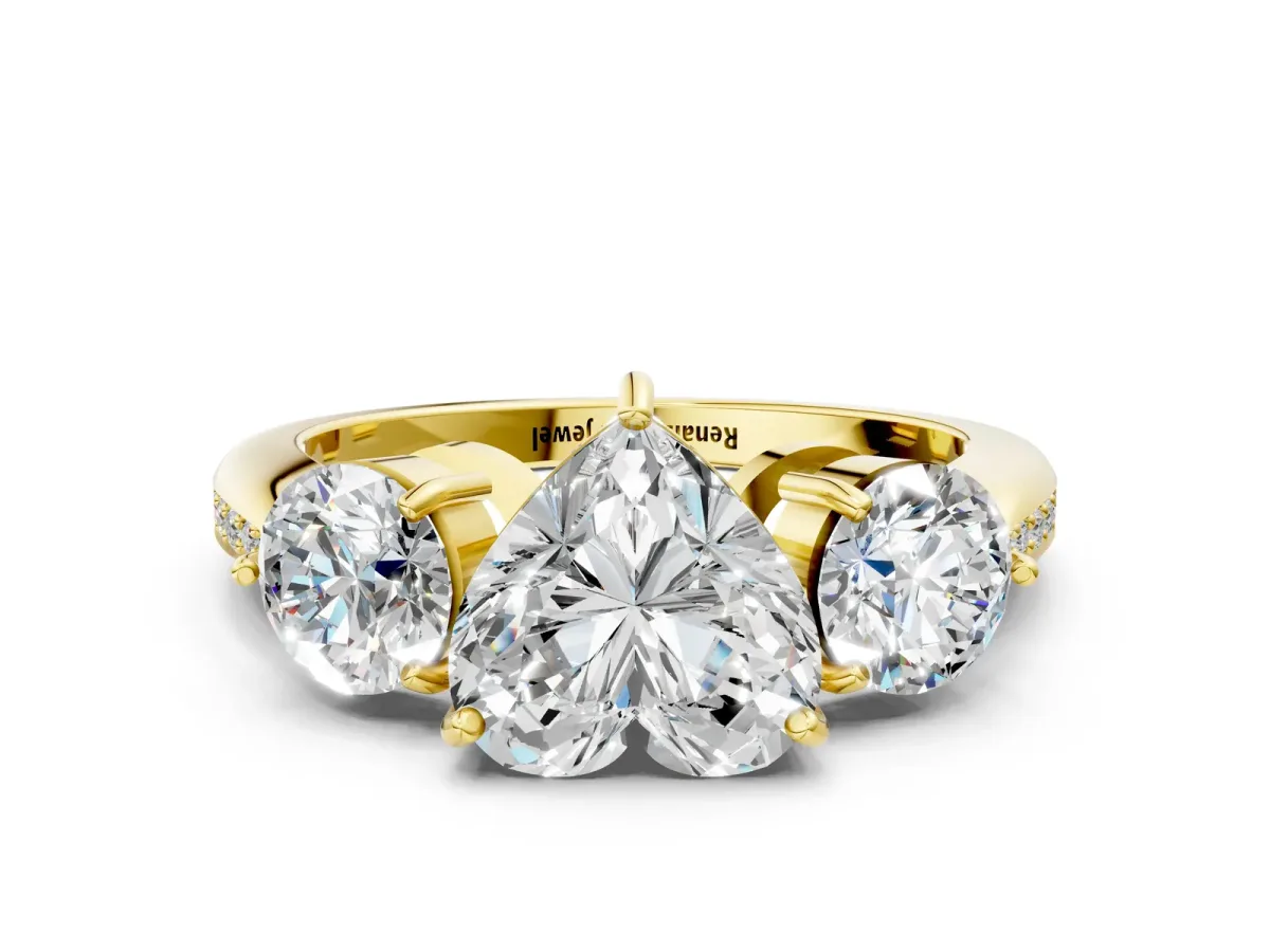 Three-Stone Heart Cut Diamond Channel Set Engagement Ring with Prong Setting Yellow gold