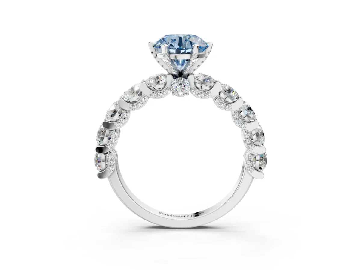 Fancy Blue Round Cut Diamond Side Stone Engagement Ring with Four-Prong Setting White gold