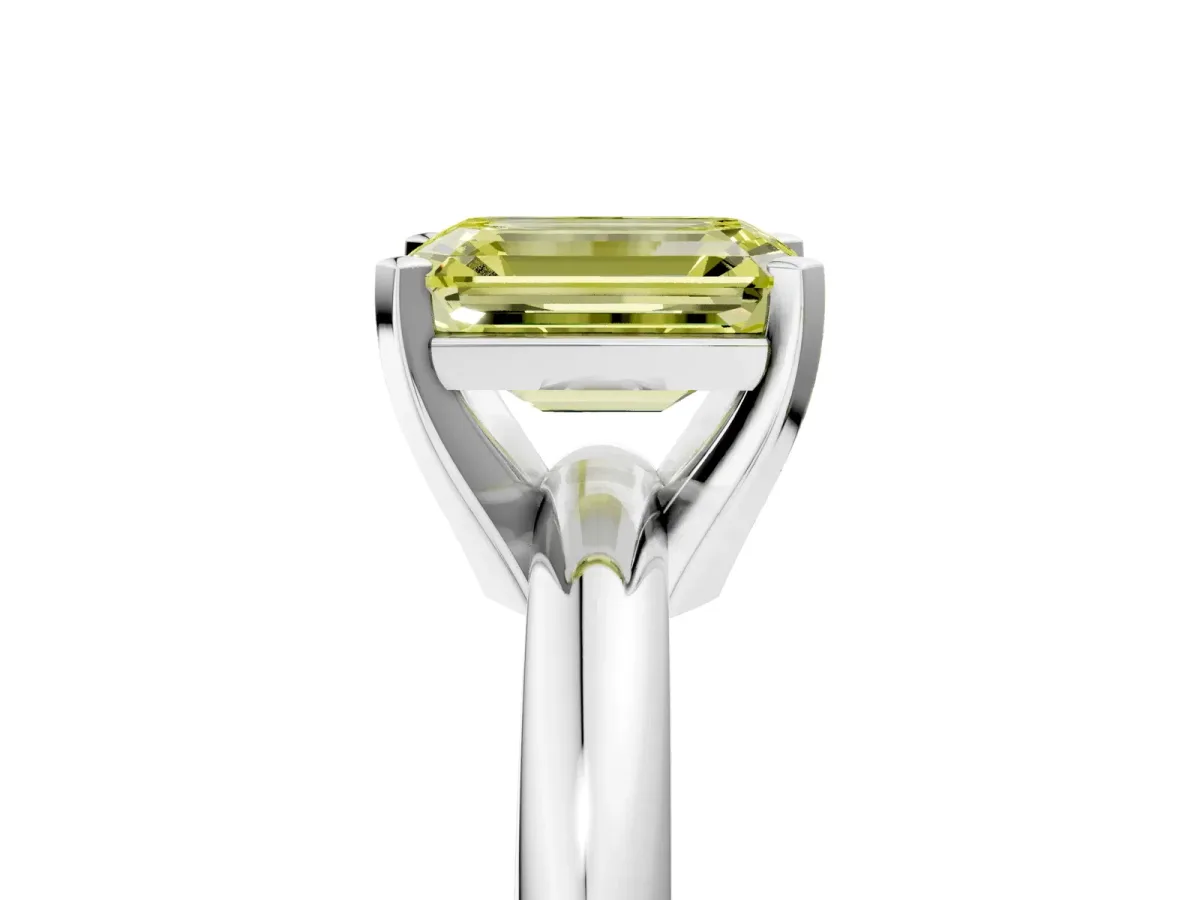 Fancy Yellow Emerald Cut Diamond Solitaire Engagement Ring with Round Band and Four-Prong Setting Silver