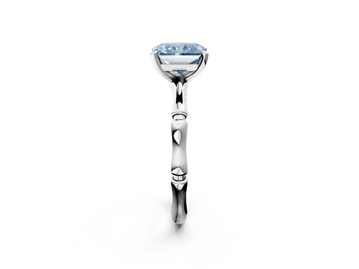 Fancy Blue Radiant Cut Solitaire Diamond Ring with Bamboo Band and Four-Prong Setting Platinum