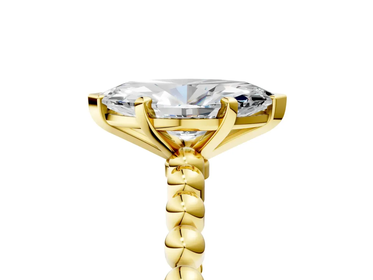 Marquise Cut Diamond Solitaire Ring with Beaded Band and Prong Setting Yellow gold