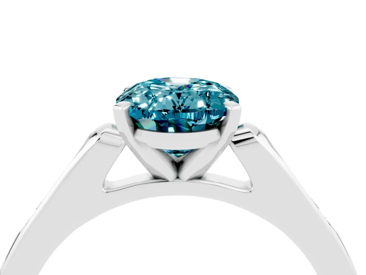 Oval Cut Blue Topaz Solitaire Ring with Channel Set Round Band and Prong Setting Silver
