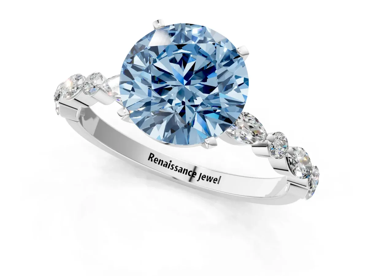 Fancy Blue Round Cut Diamond Ring with Marquise and Round Side Stones and Four-Prong Setting Silver
