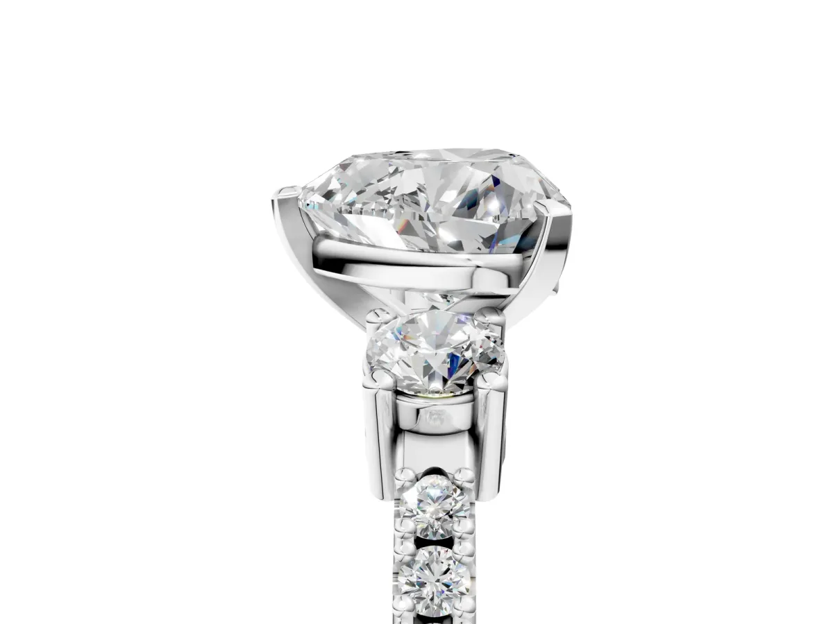 Heart Cut Cut Three-Stone Diamond Pavé Band with Prong Setting Platinum