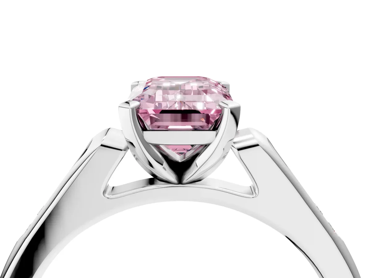 Fancy Pink Emerald Cut Diamond Solitaire Ring with Channel Set Round Band and Prong Setting Silver