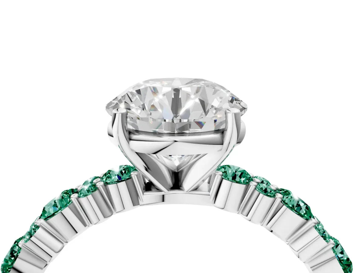 Round Cut Diamond Side Stone Solitaire Ring with Round Green Sapphire and Four-Prong Setting Silver
