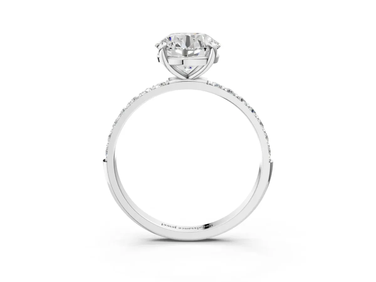 Round Cut Diamond Solitaire Ring with Round Moissanite Pavé Band and Prong Setting Silver