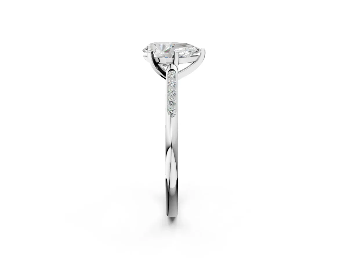Pear Cut Diamond Solitaire Ring with Channel Set Round Band and Prong Setting Silver