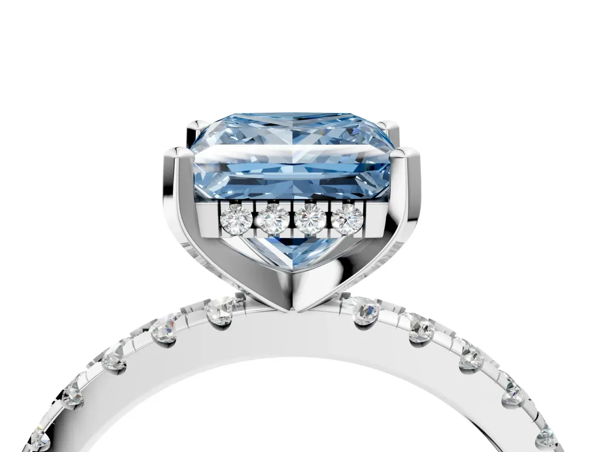 Fancy Blue Princess Cut Diamond Solitaire Ring with Round Pavé Band and Four-Prong Setting Silver