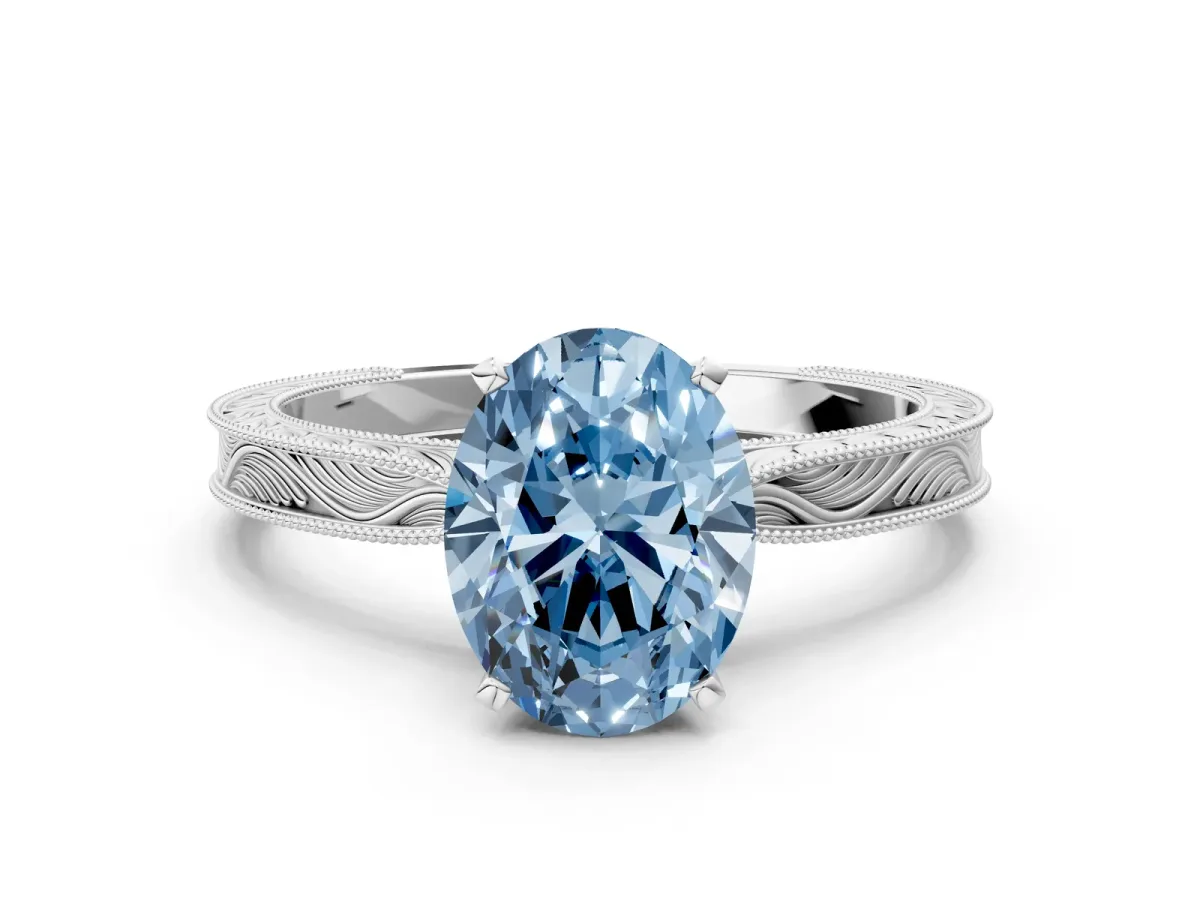 Fancy Blue Oval Cut Solitaire Milgrain Engraved Band with Four-Prong Setting White gold