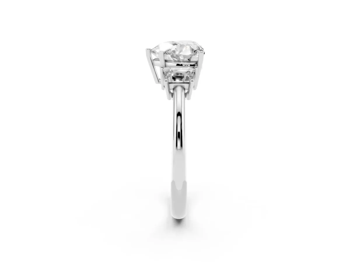 Heart Cut Diamond Three-Stone Ring with Trapezoid Side Stones and Prong Setting Platinum