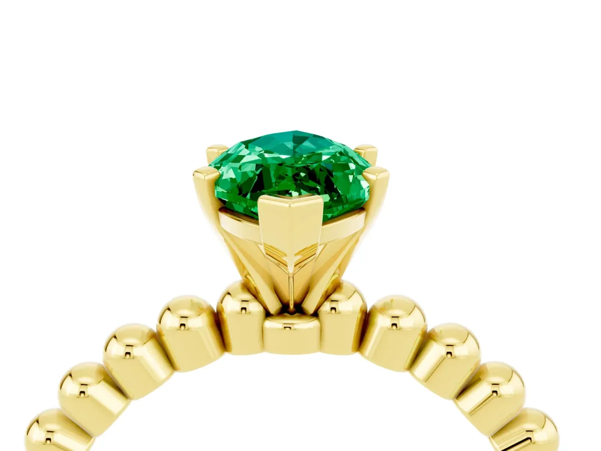 Marquise Cut Emerald Solitaire Ring with Beaded Band and Prong Setting Yellow gold