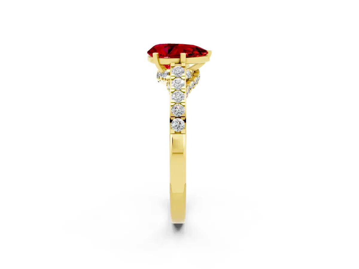 Pear Cut Ruby Solitaire Ring with Crossover Gallery and Round Pavé Band Yellow gold