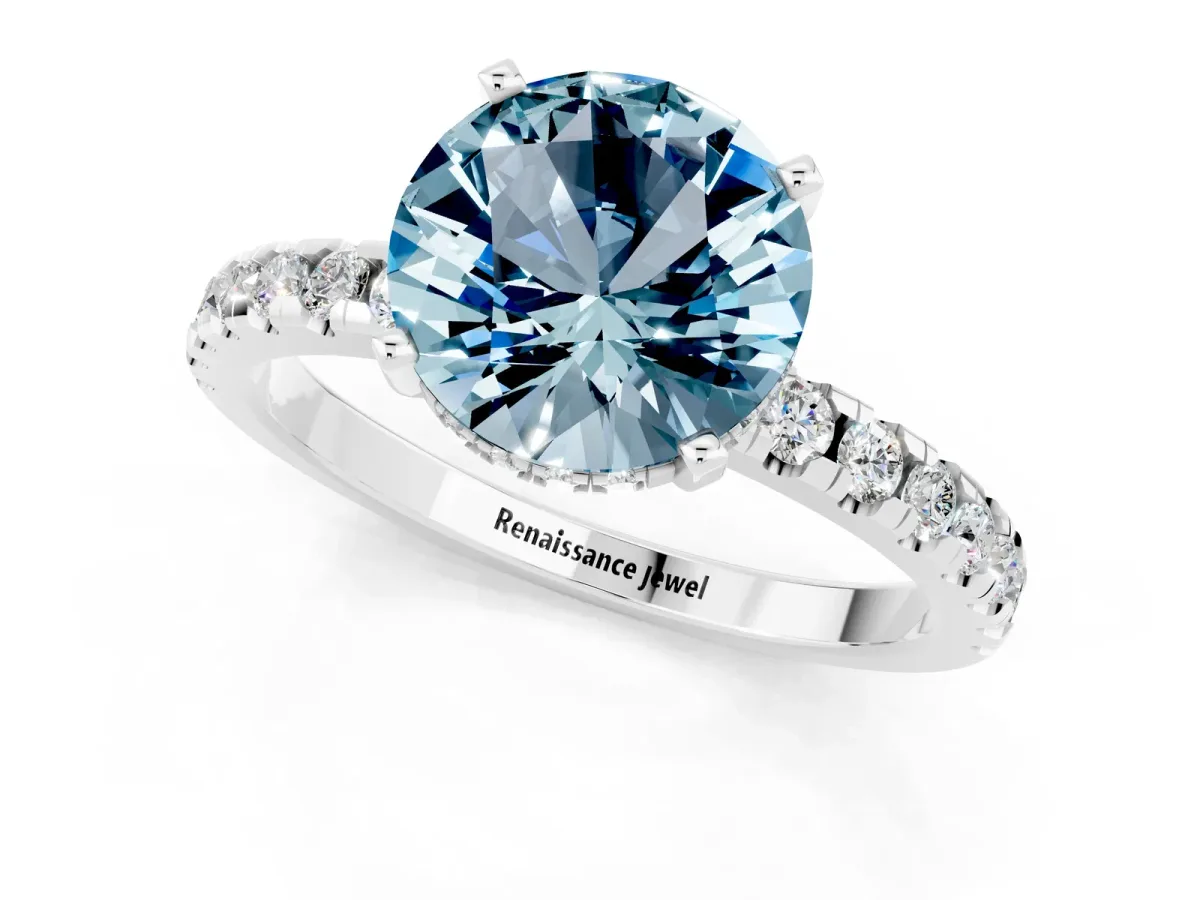 Round Cut Aquamarine Solitaire Ring with Round Pavé Band and Four-Prong Setting Silver