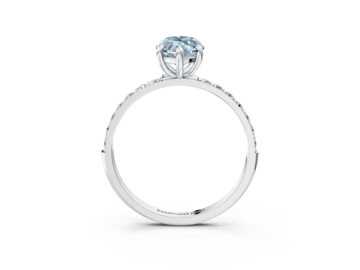Fancy Blue Marquise Cut Diamond Solitaire Ring with Round Pavé Band and Prong Setting Silver