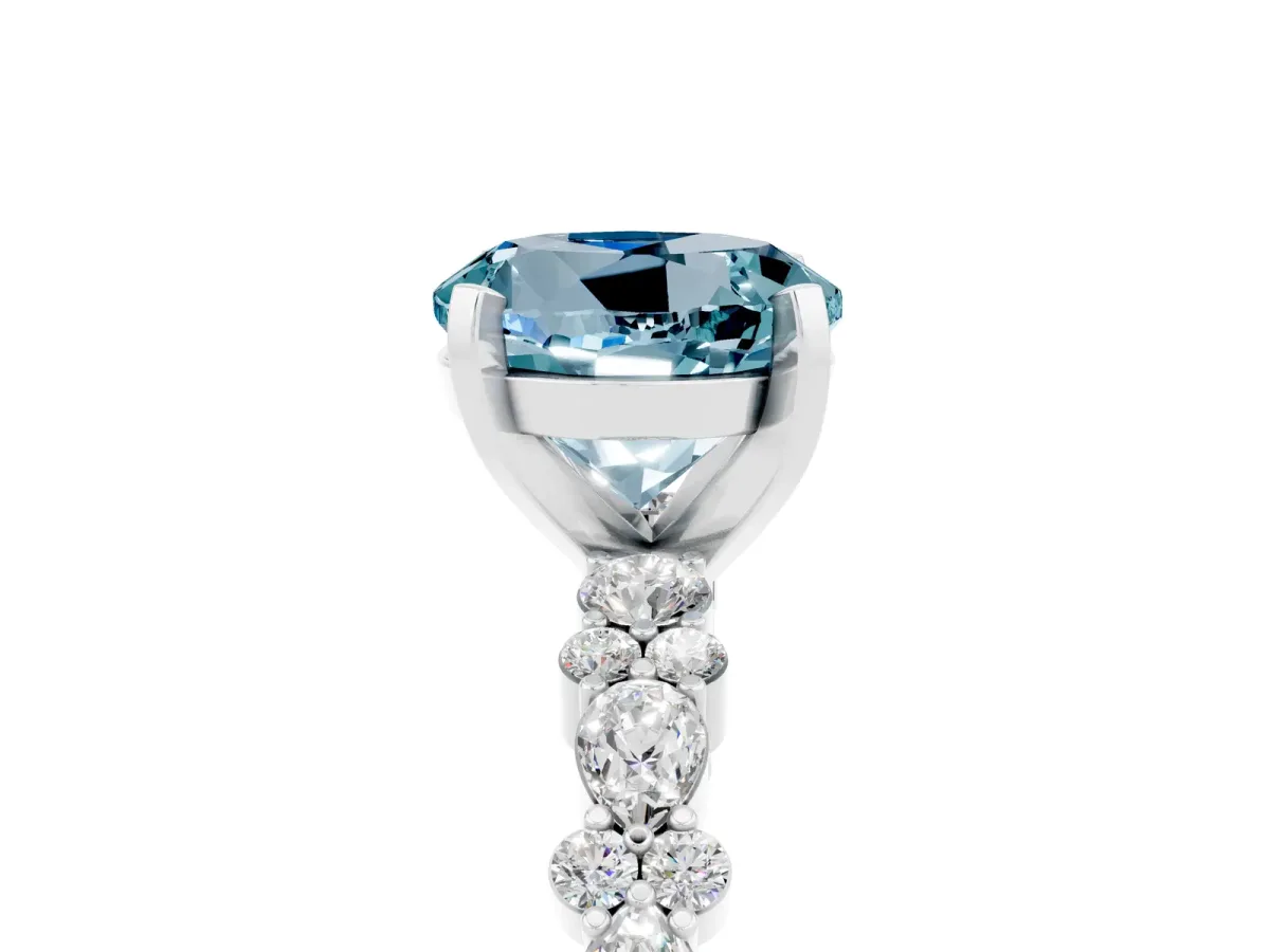 Round Cut Aquamarine Side Stone Solitaire Ring with Round and Four-Prong Setting Platinum