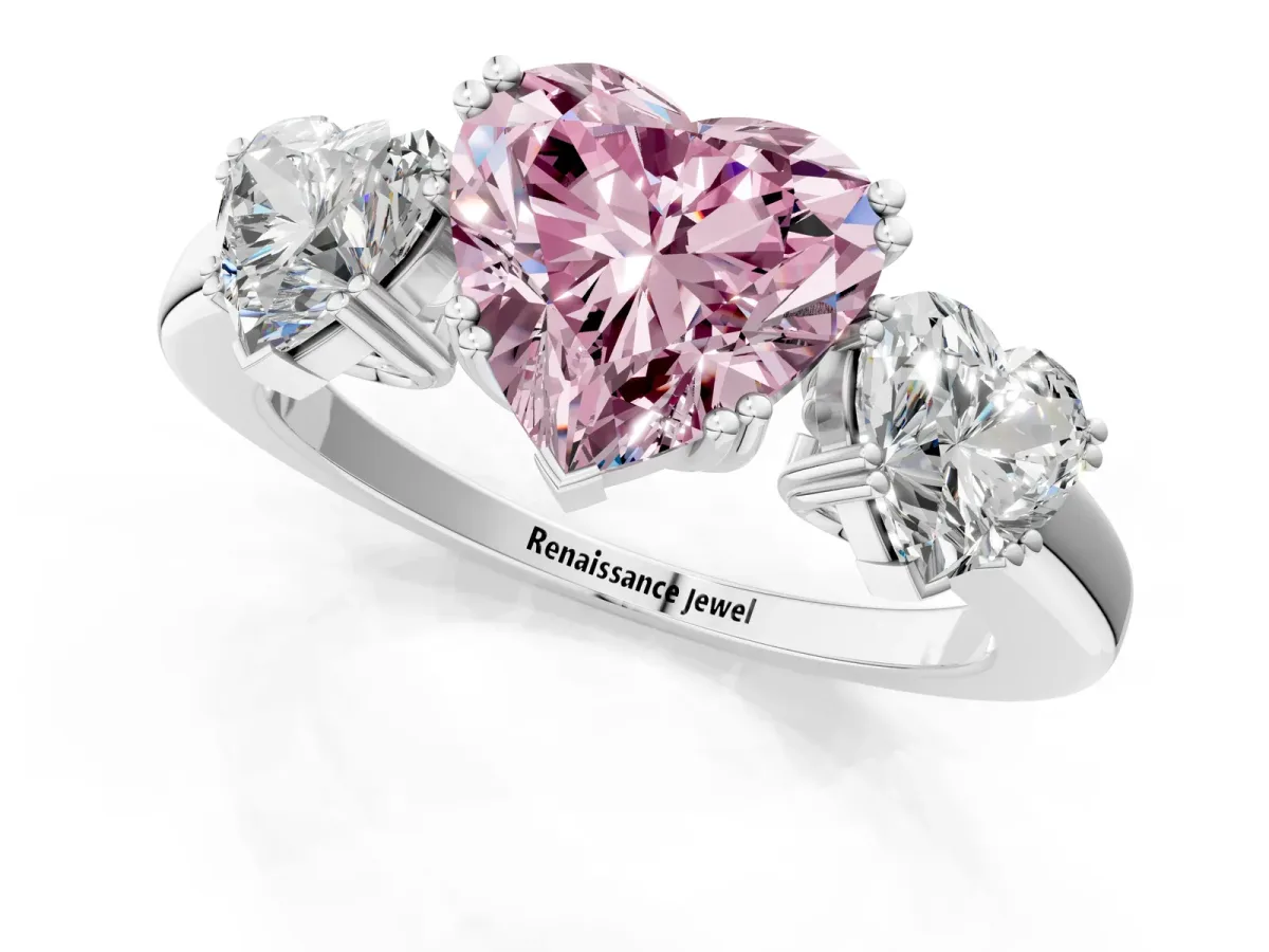 Fancy Pink Three-Stone Heart Cut Cut Diamond Ring with Channel Set Band and Four-Prong Setting Silver