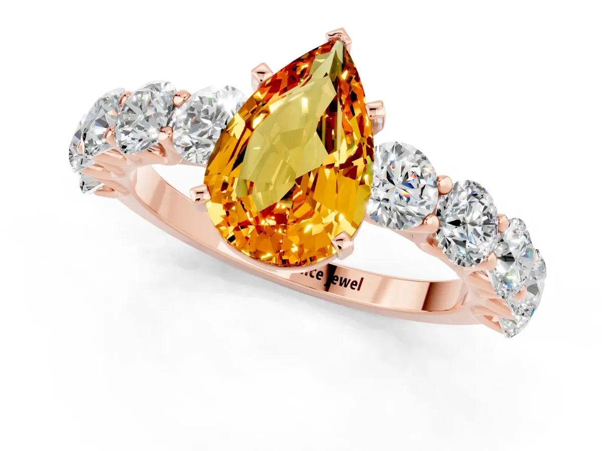 Pear Cut Citrine Prong Setting with Side Stones on a Pave Band Rose gold