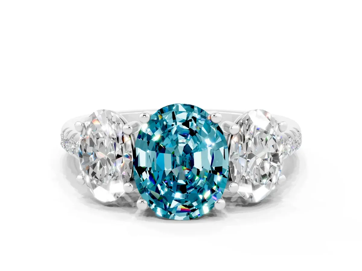 Three-Stone Oval Cut Blue Topaz Ring with Round Pavé Band and Prong Setting Silver