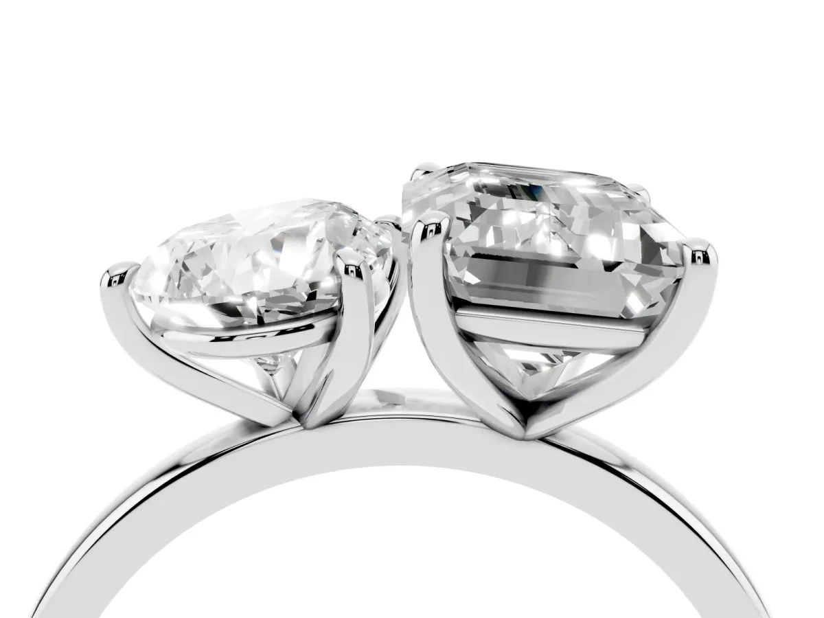 Pear Cut and Emerald Cut Toi Moi Ring with Prong Setting Platinum
