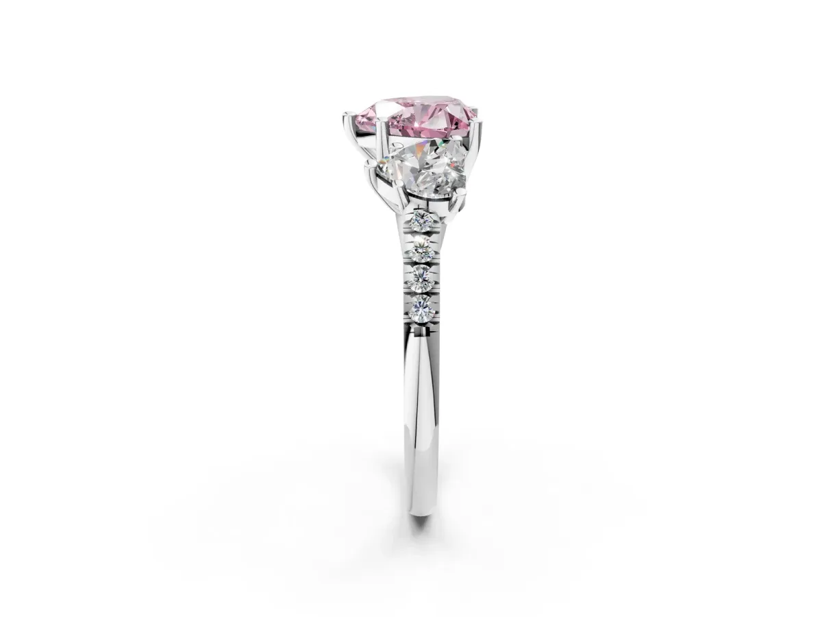 Fancy Pink Three-Stone Heart Cut Diamond Ring with Round Pavé Band and Prong Setting Silver
