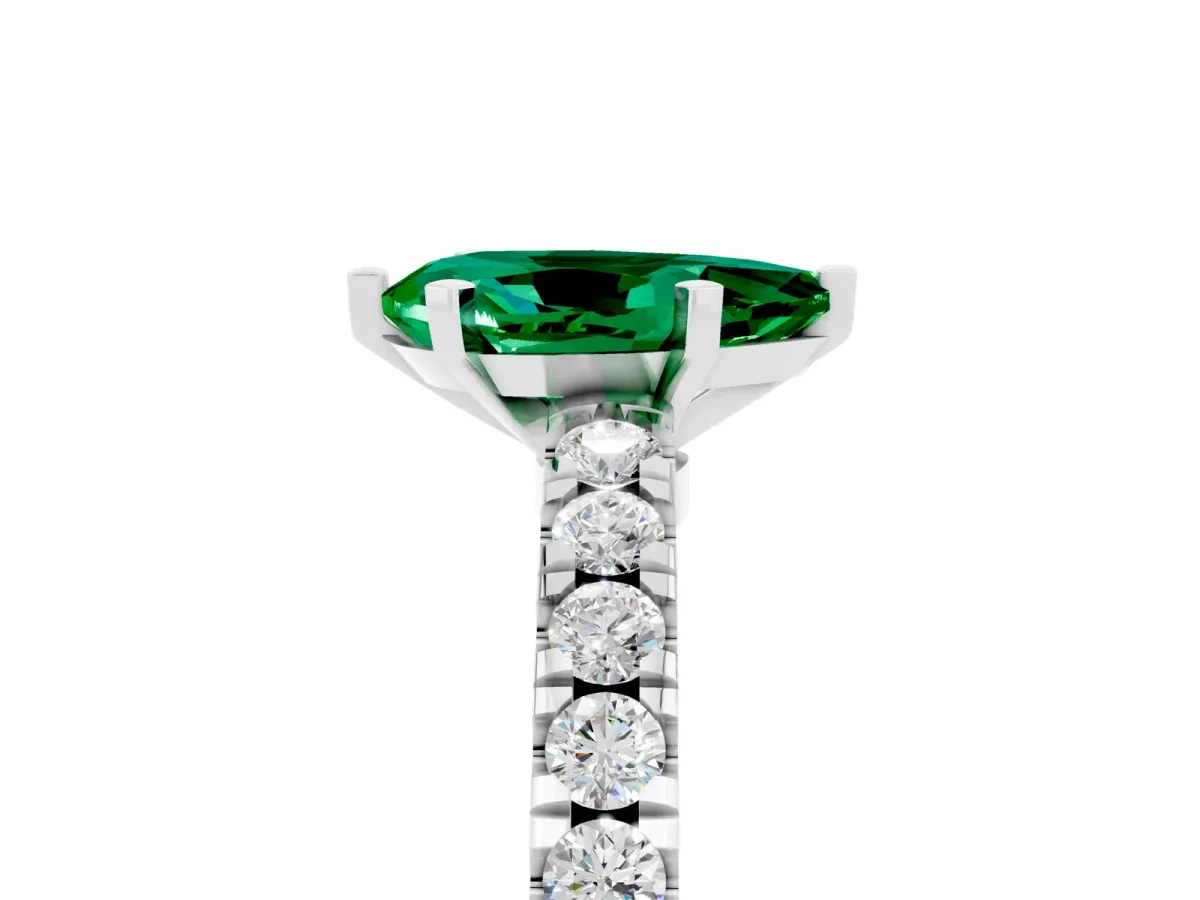 Pear Cut Solitaire Emerald with Pavé Band and Four-Prong Setting White gold