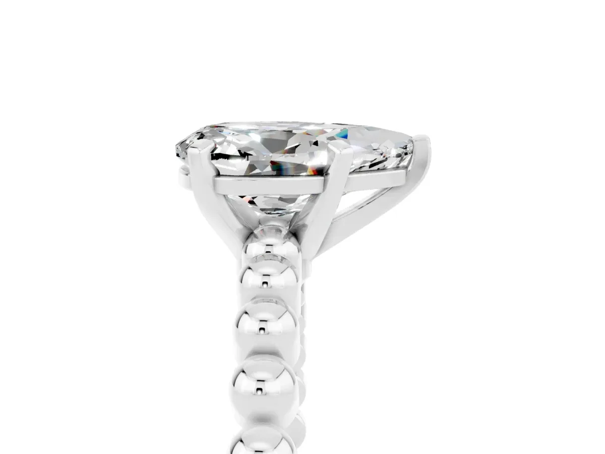 Pear Cut Moissanite Solitaire Ring with Beaded Band and Prong Setting Silver